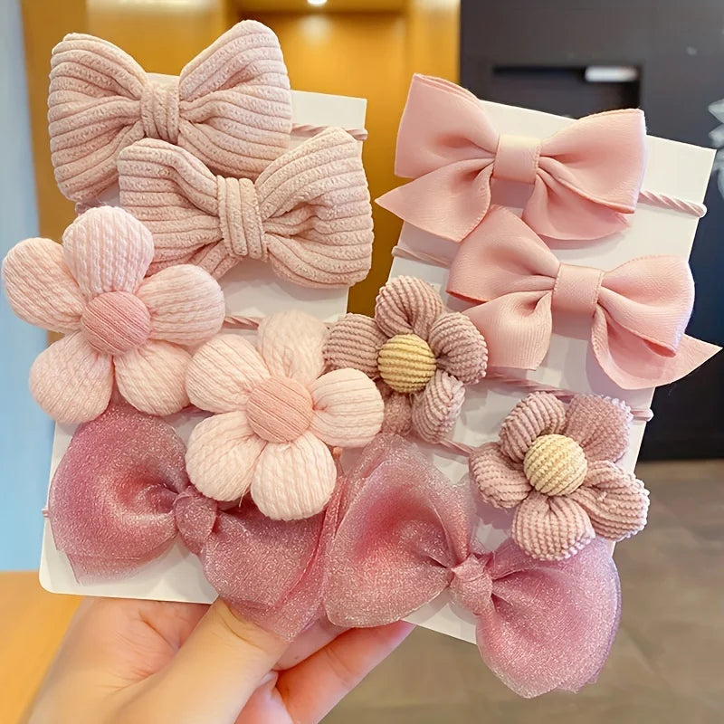 Set of cute pink and mauve flower and bow hair clips from KawaiiLands lifestyle brand